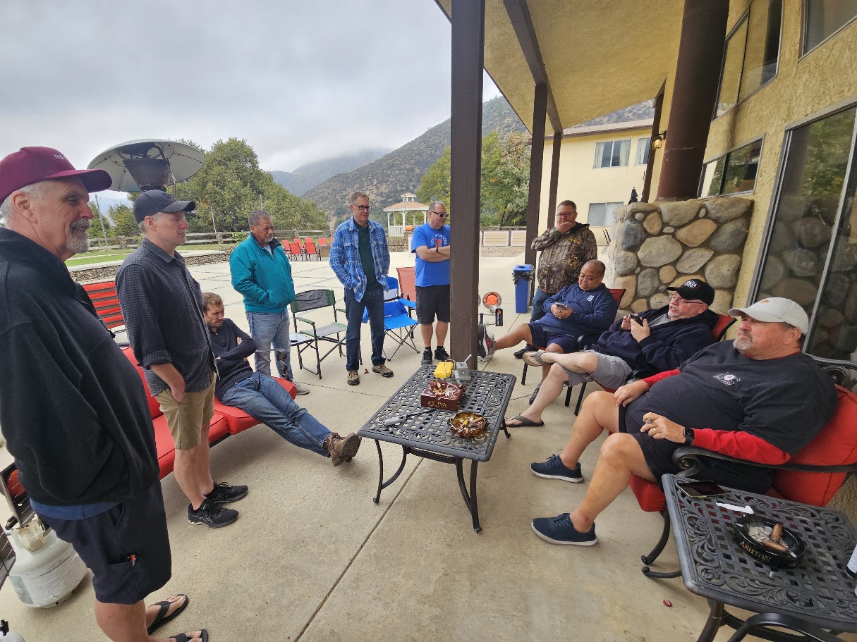 Men serving together photo